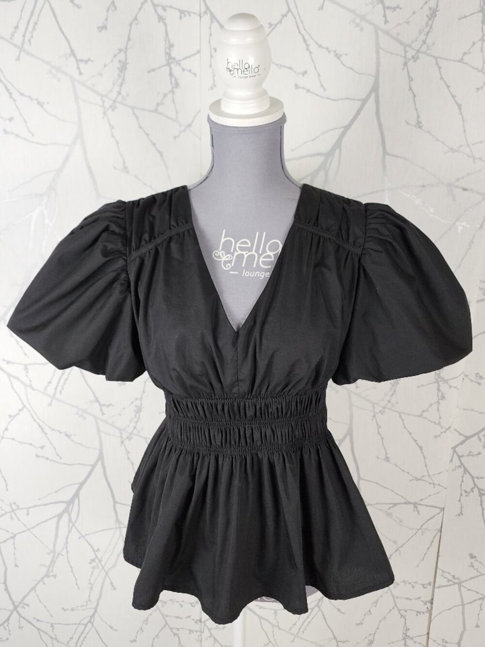 Moon River Black Smocked Peplum V-Neck Puff Sleeve Top